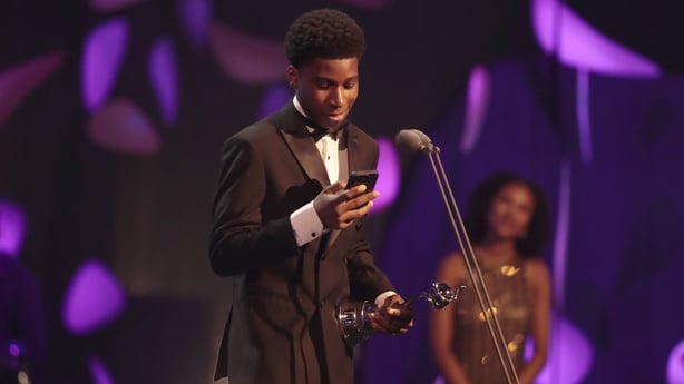 LONDON, ENGLAND - SEPTEMBER 10: (EXCLUSIVE COVERAGE) Amari Bacchus accepts the 'Drama Performance' Award on behalf of Owen Cooper during the NTA's 2025 at The O2 Arena on September 10, 2025 in London, England. (Photo by John Phillips/Getty Images for the NTA's)