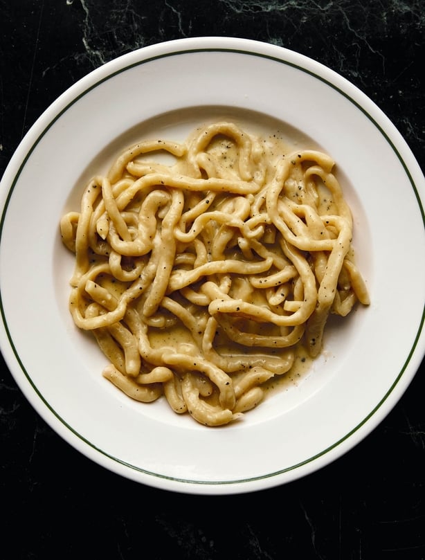 A plate of creamy pasta