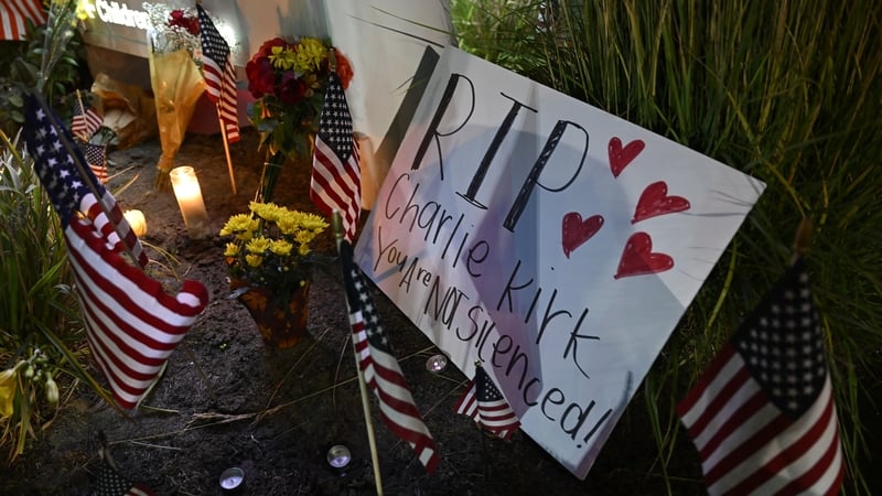Fans of Charlie Kirk leave flowers and condolences for him outside the hospital he was taken to after being shot
