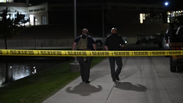 Police officers are seen near the building where Conservative activist Charlie Kirk was fatally shot during a speaking event at Utah Valley University in Orem, Utah, United States on September 10, 2025. President Donald Trump issued a proclamation ordering flags lowered on all federal buildings, mil
