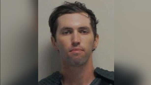 A mugshot of Tyler Robinson