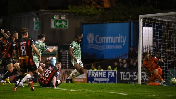The ball goes through the legs of Bohemians goalkeeper Kacper Chorazka for Derry City's second goal scored by Adam O'Reilly, left, Premier Division, September 2025