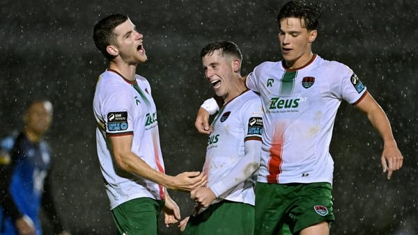 12 September 2025; Evan McLaughlin of Cork City celebrates with teammates Darragh Crowley, left, and Benny Couto after scoring their side's third goal during the Sports Direct Men’s FAI Cup quarter-final match between Finn Harps and Cork City at Finn Park