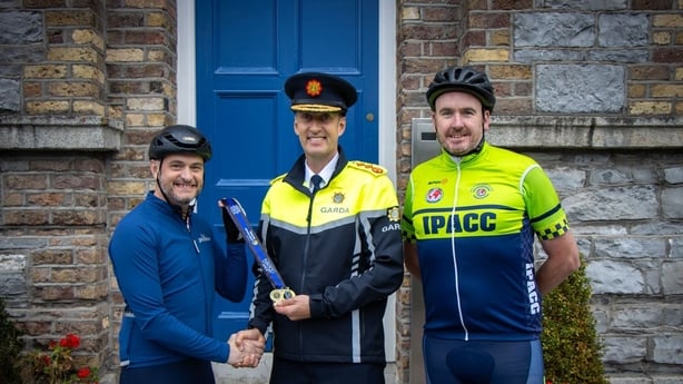 Garda Commissioner Justin Kelly made a special presentation to the organisers of the cycle, including Garda Neil O'Malley (L) and Kevin Cleary (R)