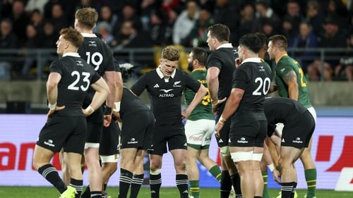 A dejected Damian McKenzie (C) of New Zealand during the defeat