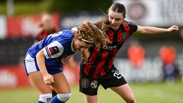 Kate Jones of Treaty United is tackled by Leiagh Glennon of Bohemians during the Sports Direct Women's FAI Cup semi-final match between Bohemians and Treaty United at Dalymount Park in Dublin.