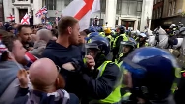 Anti-immigration protesters clash with police in central London