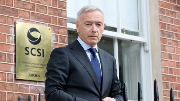 Gerard O'Toole standing outside SCSI offices