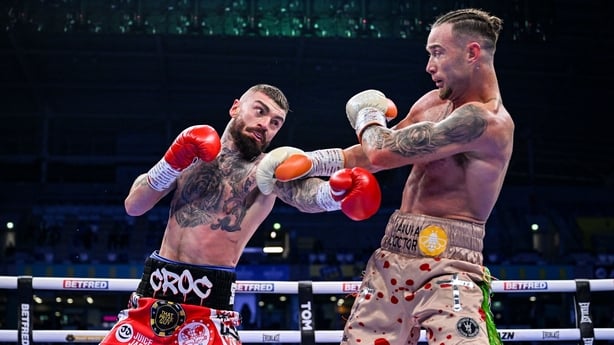 Lewis Crocker, left, and Paddy Donovan during their IBF World Welterweight title bout at Clearer Twist National Football Stadium at Windsor Park in Belfast.