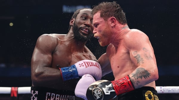 LAS VEGAS, NEVADA - SEPTEMBER 13: (L-R) Terence Crawford exchanges punches with Canelo Alvarez in their undisputed super middleweight title fight during Netflix's Canelo v Crawford Fight Night at Allegiant Stadium on September 13, 2025 in Las Vegas, Nevad
