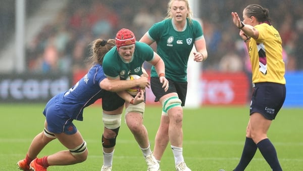 14 September 2025; Aoife Wafer of Ireland is tackled by Lea Champon of France during the Women's Rugby World Cup 2025 quarter-final match between France and Ireland at Sandy Park in Exeter, England. Photo by Harry Murphy/Sportsfile