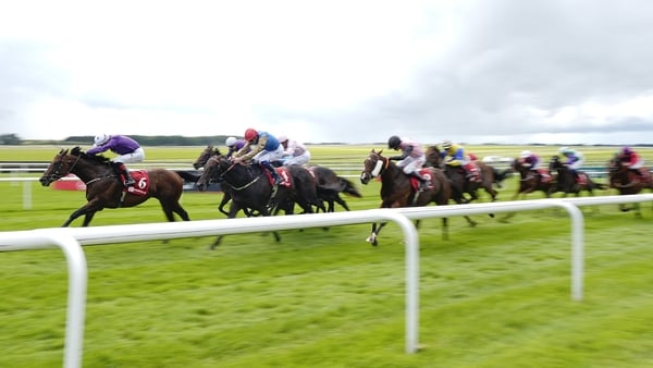KILDARE, IRELAND - SEPTEMBER 14: David Egan riding Arizona Blaze (L) win The Bar One Racing Flying Five Stakes at Curragh Racecourse on September 14, 2025 in Kildare, Ireland. (Photo by Alan Crowhurst/Getty Images)
