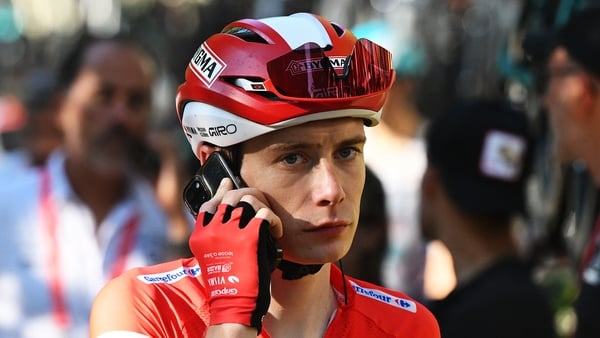 Jonas Vingegaard of Denmark and Team Visma | Lease a Bike - Red Leader Jersey and the peloton is at a standstill due to the pro-Palestinian protests in the city of Madrid during the La Vuelta - 80th Tour of Spain 2025, Stage 21 a 108km stage from Alalpard
