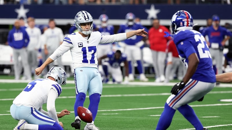 Brandon Aubrey of the Dallas Cowboys kicks that field goal in overtime