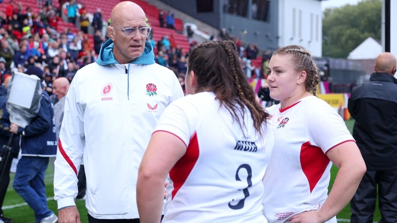 John Mitchell chats to his players after their win over Scotland