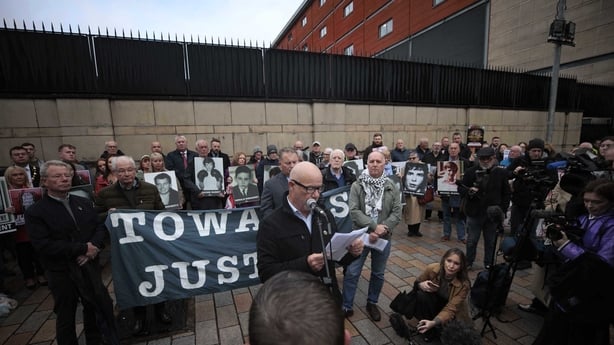John McKinney (centre) whose brother were killed on Bloody Sunday speaks outside Laganside Court, where the trial of a former paratrooper accused of the murder of two men on Bloody Sunday is taking place.