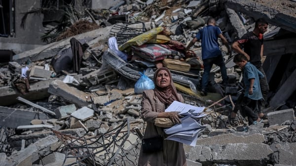 GAZA CITY, GAZA - SEPTEMBER 15: Palestinians search among the rubble for usable items after Israeli attacks on the Rimal neighborhood in Gaza City, Gaza on September 15, 2025. (Photo by Saeed M. M. T. Jaras/Anadolu via Getty Images)