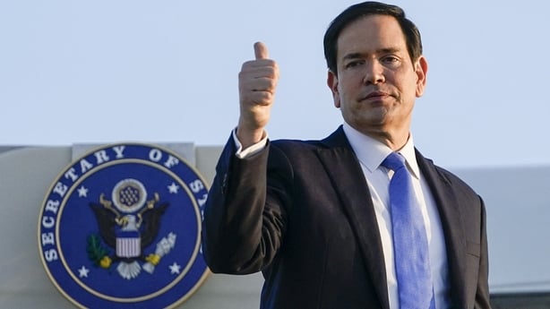 US Secretary of State Marco Rubio boards a plane as he departs Tel Aviv for Qatar