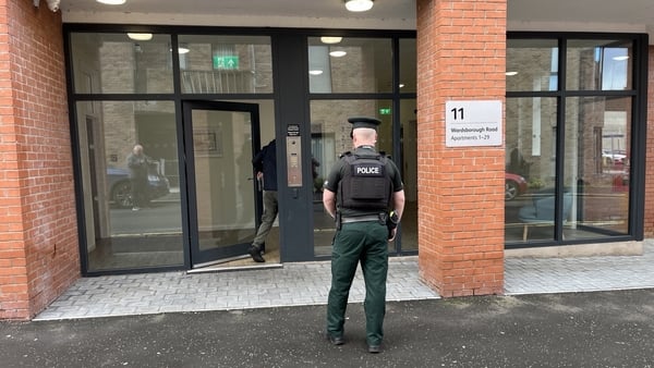 A police officer at the scene in Lisburn