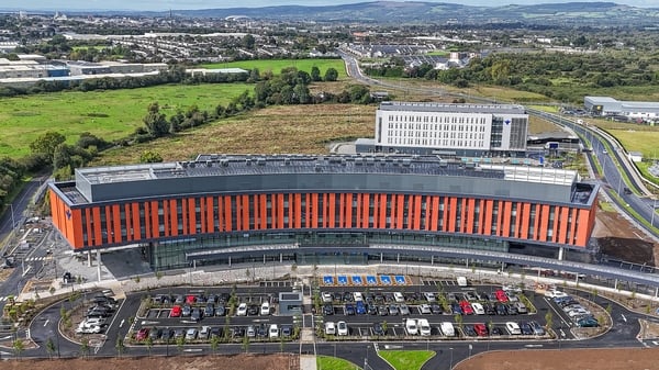 A drone image of a new red fronted hospital building