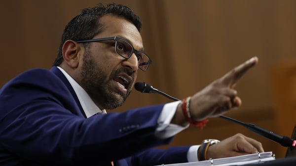 Kash Patel gesturing while testifying before the Senate Judiciary Committee