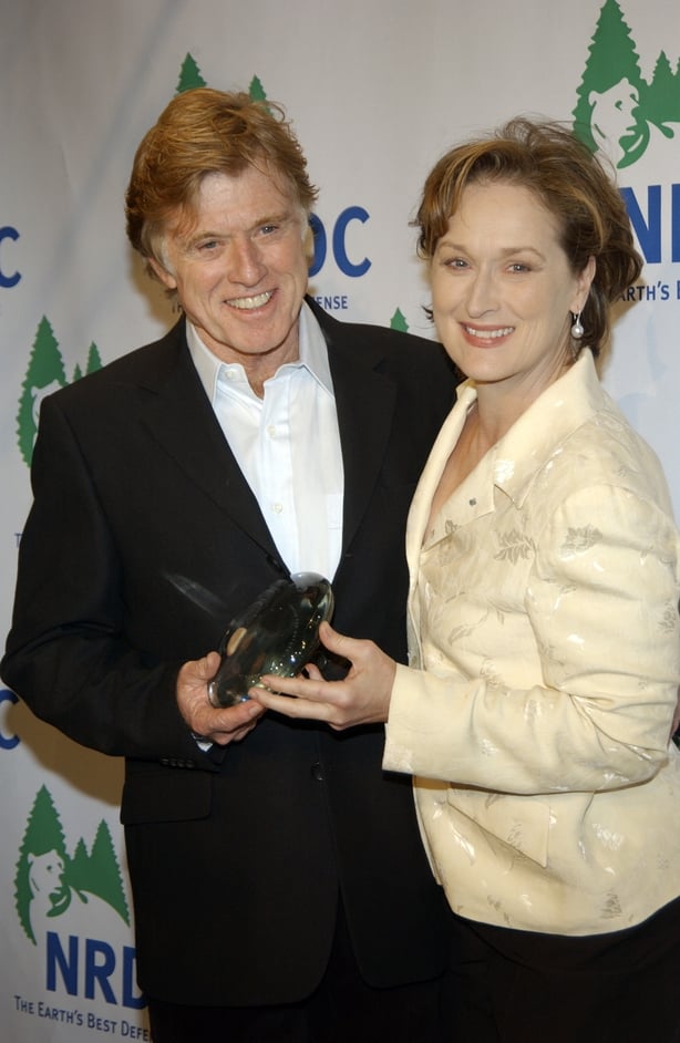 Robert Redford with the Forces of Nature Award presented by Meryl Streep