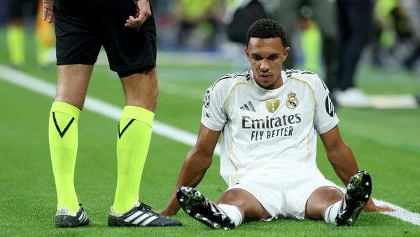 Real Madrid's English defender #12 Trent Alexander-Arnold reacts on the ground after suffering an injury during the UEFA Champions League first round day 1 football match between Real Madrid CF and Olympique de Marseille at the Santiago Bernabeu stadium i