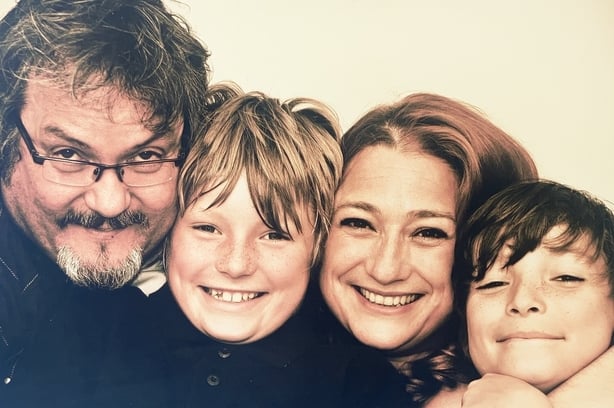 Niamh Kavanagh in a family portrait with her husband Paul and their two sons