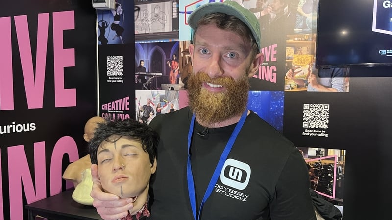 Ciarán Cooke from Odyssey Studios shows off his film prop to the students