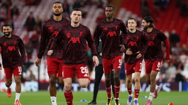 LIVERPOOL, ENGLAND - SEPTEMBER 17: (THE SUN OUT, THE SUN ON SUNDAY OUT) Alexander Isak of Liverpool warms up with teammates prior to the UEFA Champions League 2025/26 League Phase MD1 match between Liverpool FC and Atletico de Madrid at Anfield on Septemb