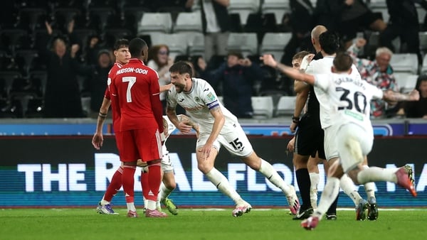 SWANSEA, WALES - SEPTEMBER 17: Cameron Burgess of Swansea City celebrates scoring his team's third goal during the Carabao Cup Third Round match between Swansea City and Nottingham Forest at Swansea.com Stadium on September 17, 2025 in Swansea, Wales. (Ph