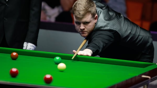 NANJING, CHINA - NOVEMBER 04: Aaron Hill of Ireland plays a shot in the second round match against Mark Allen of Northern Ireland on day 2 of 2024 International Championship at Southern New City (SNC) National Fitness Center on November 4, 2024 in Nanjing