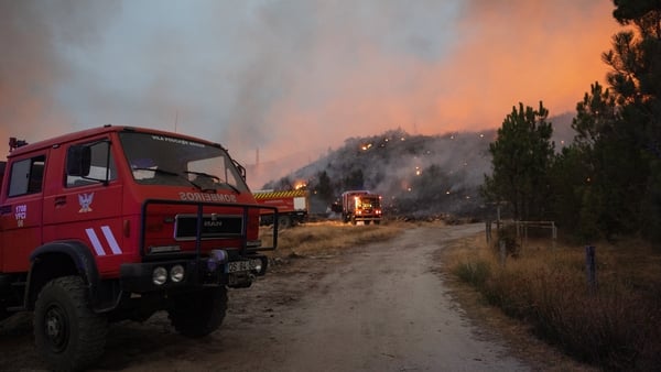 Fire truck seen as firefighters work to extinguish a wildfire that had been burning in Vila Real, Portugal