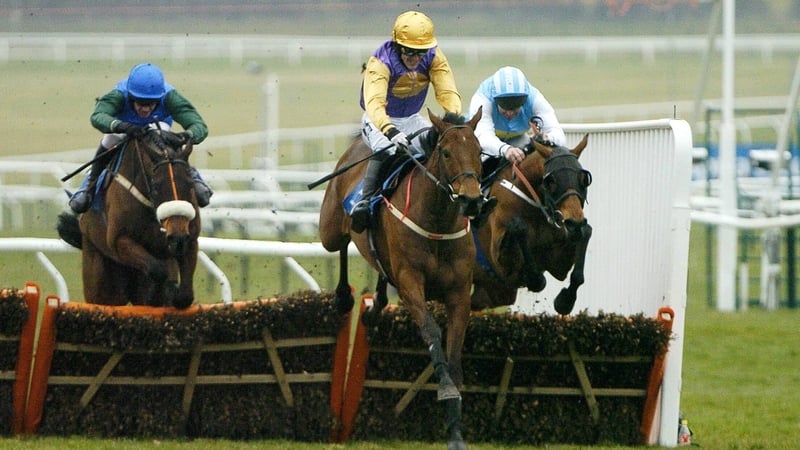 Brave Inca leads over the final flight in the 2006 Champion Hurdle at Cheltenham