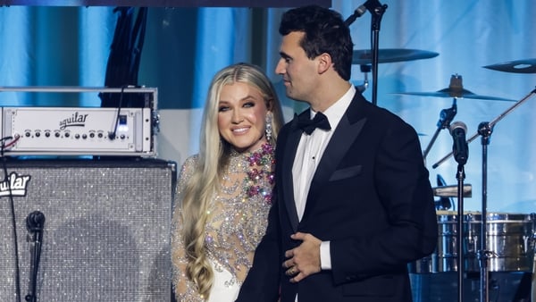WASHINGTON, DC - JANUARY 19: Charlie Kirk (R) and and his wife Erika Lane Frantzve (L) on stage during the Turning Point USA Inaugural-Eve Ball at the Salamander Hotel on January 19, 2025 in Washington, DC. (Photo by Samuel Corum/Getty Images) *** Local C