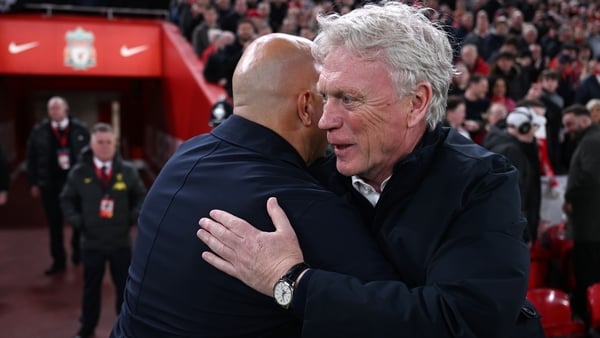 David Moyes, Manager of Everton, hugs Arne Slot, Manager of Liverpool, prior to the Premier League match between Liverpool FC and Everton FC at Anfield