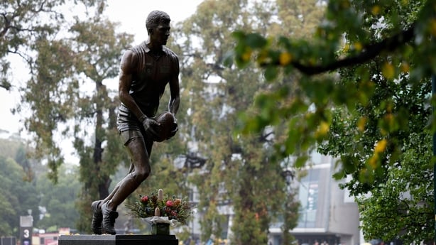 The Jim Stynes statue is seen before the 2025 AFL Round 01 match between the Melbourne Demons and the GWS Giants at the Melbourne Cricket Ground on March 16, 2025 in Melbourne