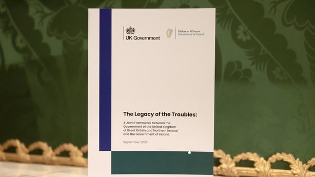 A copy of the newly published joint framework report addressing the legacy of the Northern Ireland Troubles on display