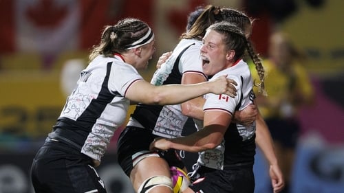 Canada's Sophie de Goede celebrates scoring her sides fourth try
