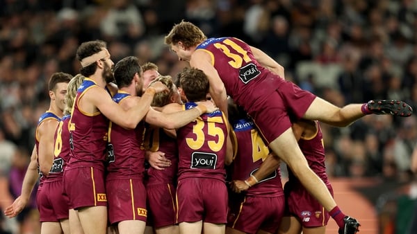 MELBOURNE, AUSTRALIA - SEPTEMBER 20: Dayne Zorko of the Lions is congratulated by team mates after kicking a goal during the AFL Preliminary Final match between Collingwood Magpies and Brisbane Lions at Melbourne Cricket Ground on September 20, 2025 in Me