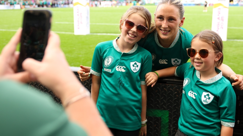 Ireland's Anna McGann with young supporters after the World Cup match against Japan