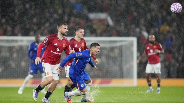 Manchester United's Luke Shaw (left) and Chelsea's Enzo Fernandez battle for the ball