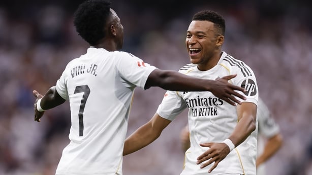 MADRID, SPAIN - SEPTEMBER 20: Kylian Mbappe player of Real Madrid celebrates with his teammate Vinicius Junior after scoring a goal during the LaLiga EA Sports match between Real Madrid CF and RCD Espanyol de Barcelona at Estadio Santiago Bernabeu on September 20, 2025 in Madrid, Spain. (Photo by An