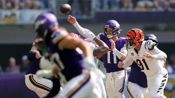 MINNEAPOLIS, MINNESOTA - SEPTEMBER 21: Carson Wentz #11 of the Minnesota Vikings throws a pass against the Cincinnati Bengals during the third quarter at U.S. Bank Stadium on September 21, 2025 in Minneapolis, Minnesota. (Photo by Adam Bettcher/Getty Images)