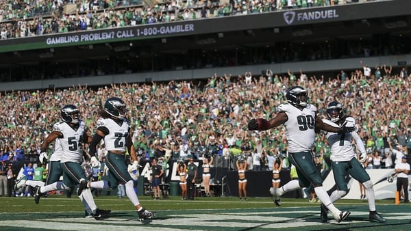 Jordan Davis of the Philadelphia Eagles reacts after returning a blocked field goal in the final moments of the game for a touchdown