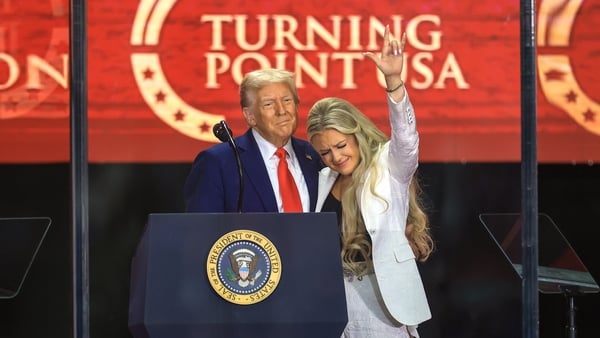 Erika Kirk joins US President Donald Trump onstage during the memorial service for political activist Charlie Kirk