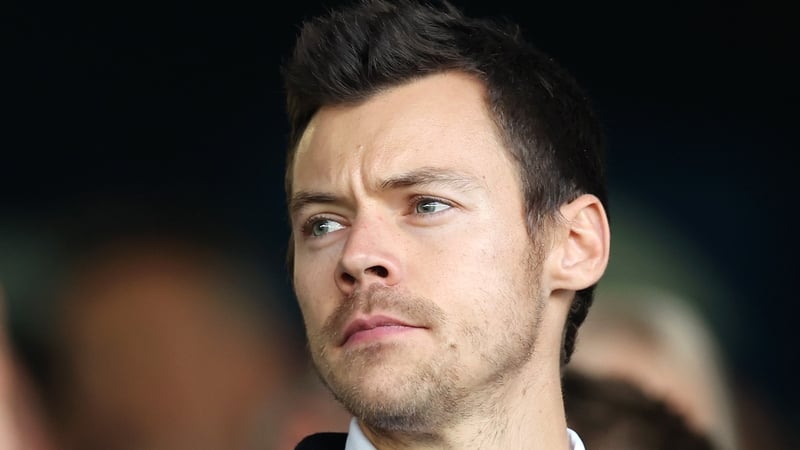 Harry Styles - Photos, widely shared online, show the former One Direction star embarking on the race dressed in shorts, brightly coloured trainers, a dark top, sunglasses, and a headband