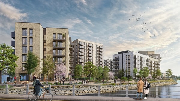 A computer generated image of apartment blocks beside a water walkway