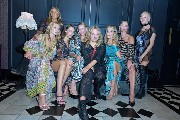LONDON, ENGLAND - SEPTEMBER 19: (L to R) Azzi Glasser, Jasmin Brunner, India Chaplin, Kiera Chaplin, Ginny Litscher, Laura Whitmore, Jodie Kidd and Rose McGowan attend the Ginny Litsher show during LFW September 2025 at L'oscar London on September 19, 2025 in London, England. (Photo by Tracey Welch/