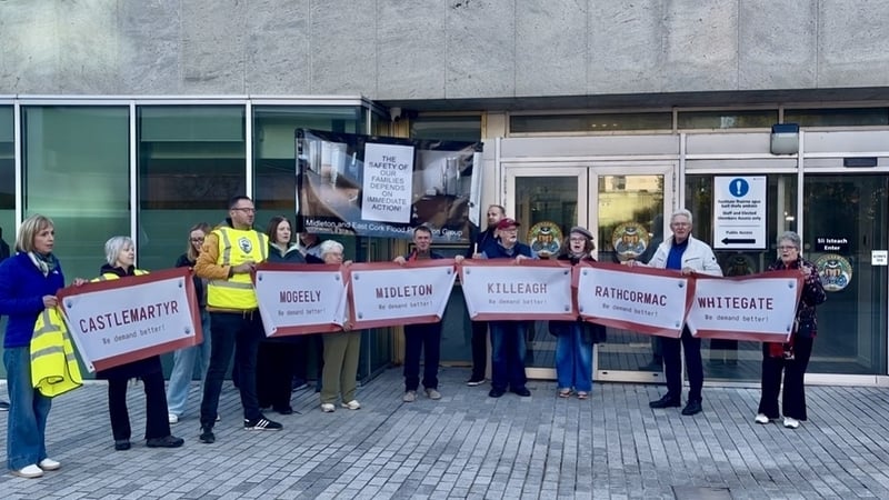 East Cork residents whose homes and businesses were flooded in the aftermath of Storm Babet two years ago protested outside Cork County Council's HQ earlier today